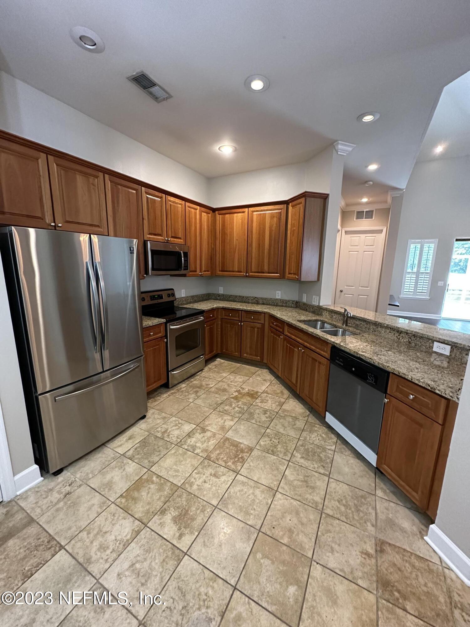 2014 Pond Ridge Court, Unit 1104 Fleming Island, FL 32003 - Photo 11 of 35 Kitchen