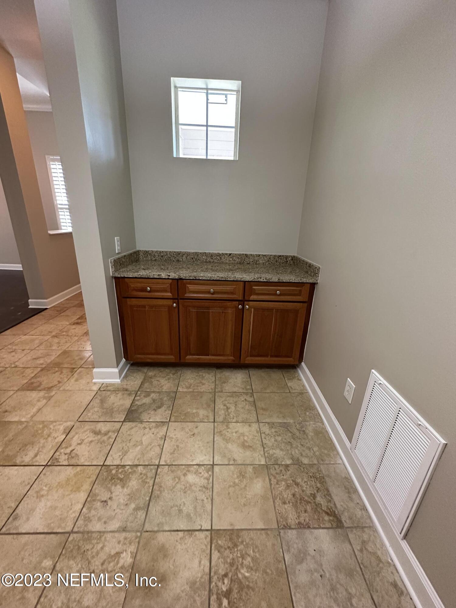 2014 Pond Ridge Court, Unit 1104 Fleming Island, FL 32003 - Photo 13 of 35 Buffet in kitchen