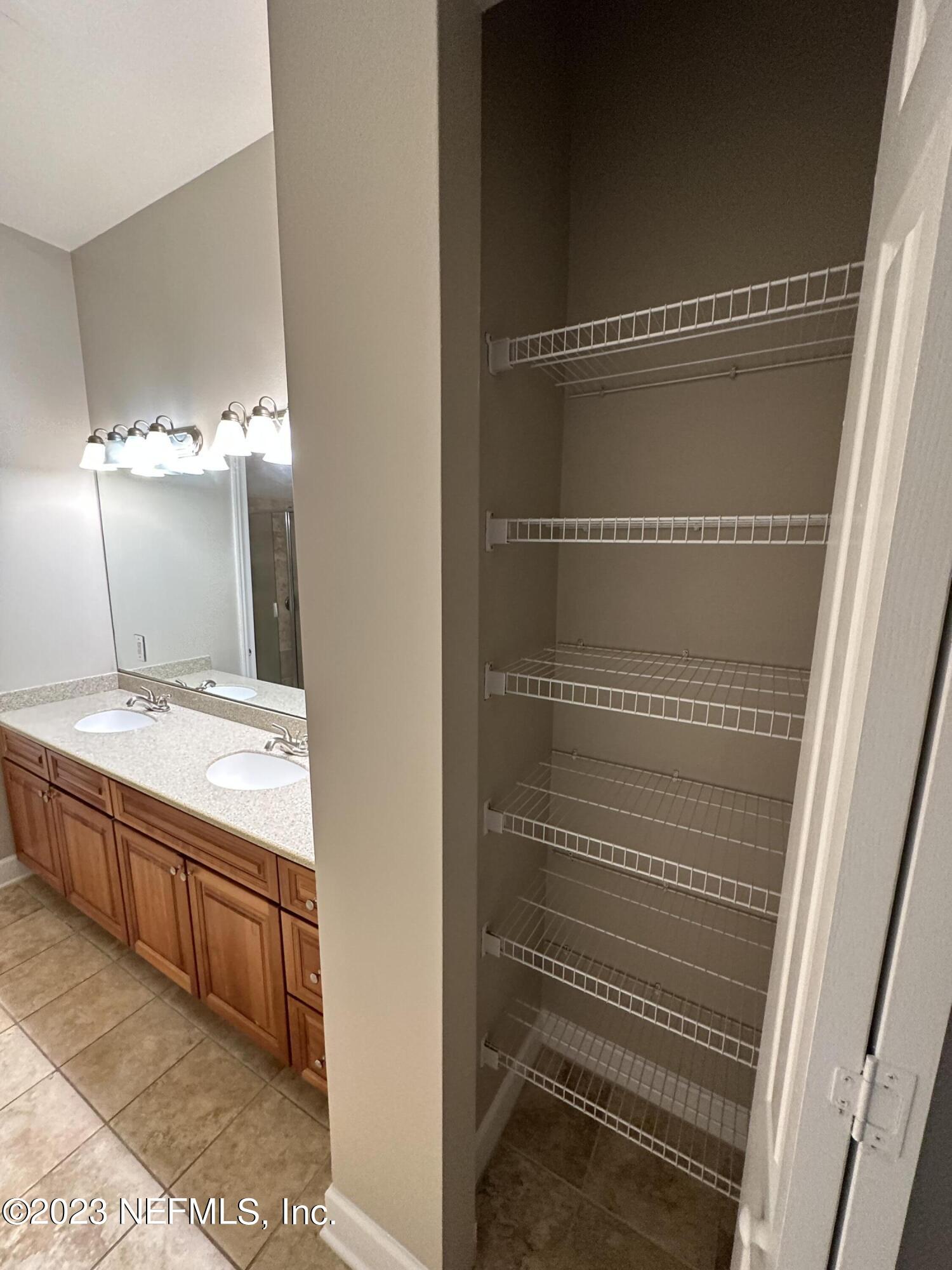 2014 Pond Ridge Court, Unit 1104 Fleming Island, FL 32003 - Photo 20 of 35 Owners linen closet