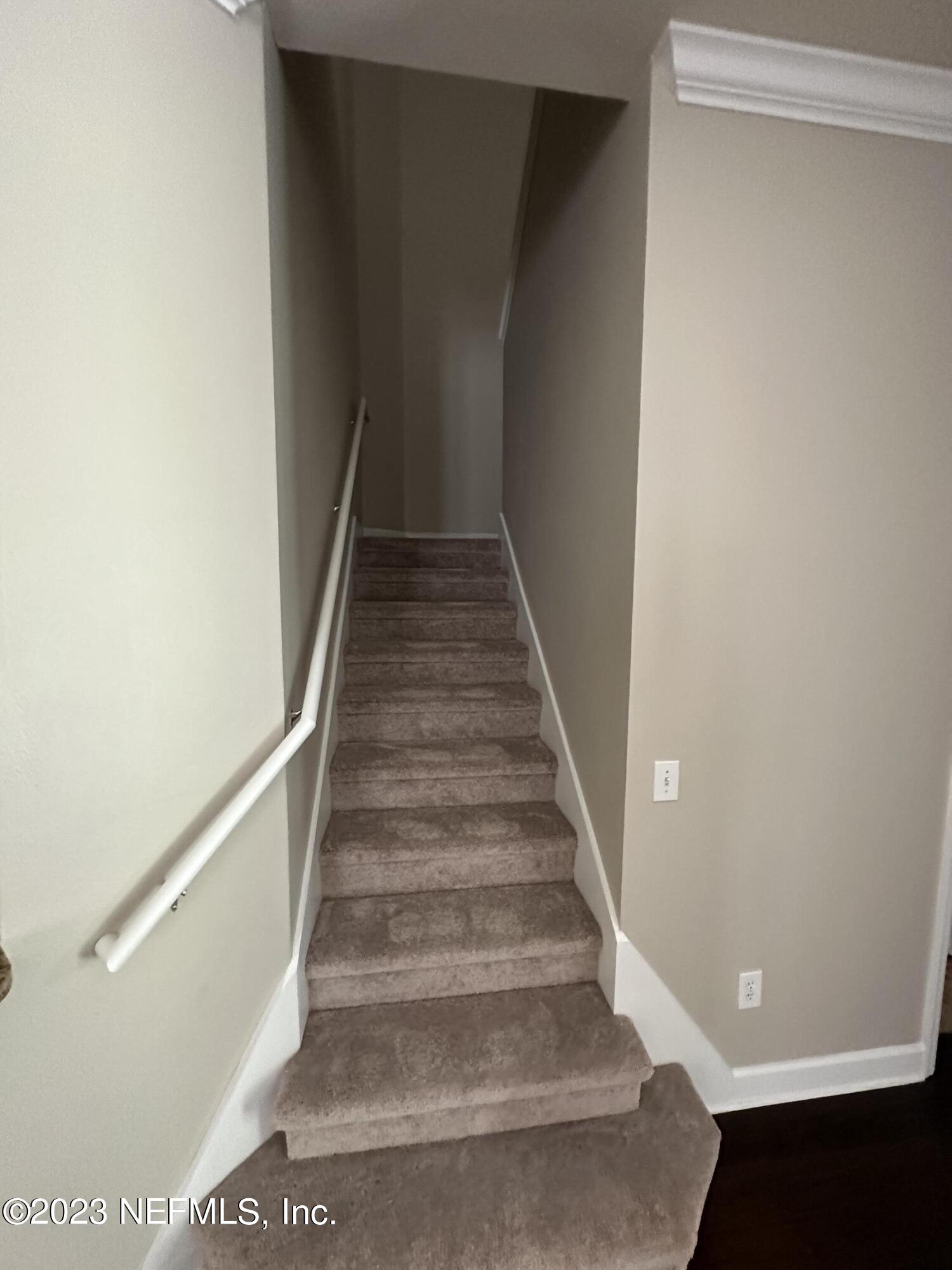 2014 Pond Ridge Court, Unit 1104 Fleming Island, FL 32003 - Photo 25 of 35 New carpet on stairwell