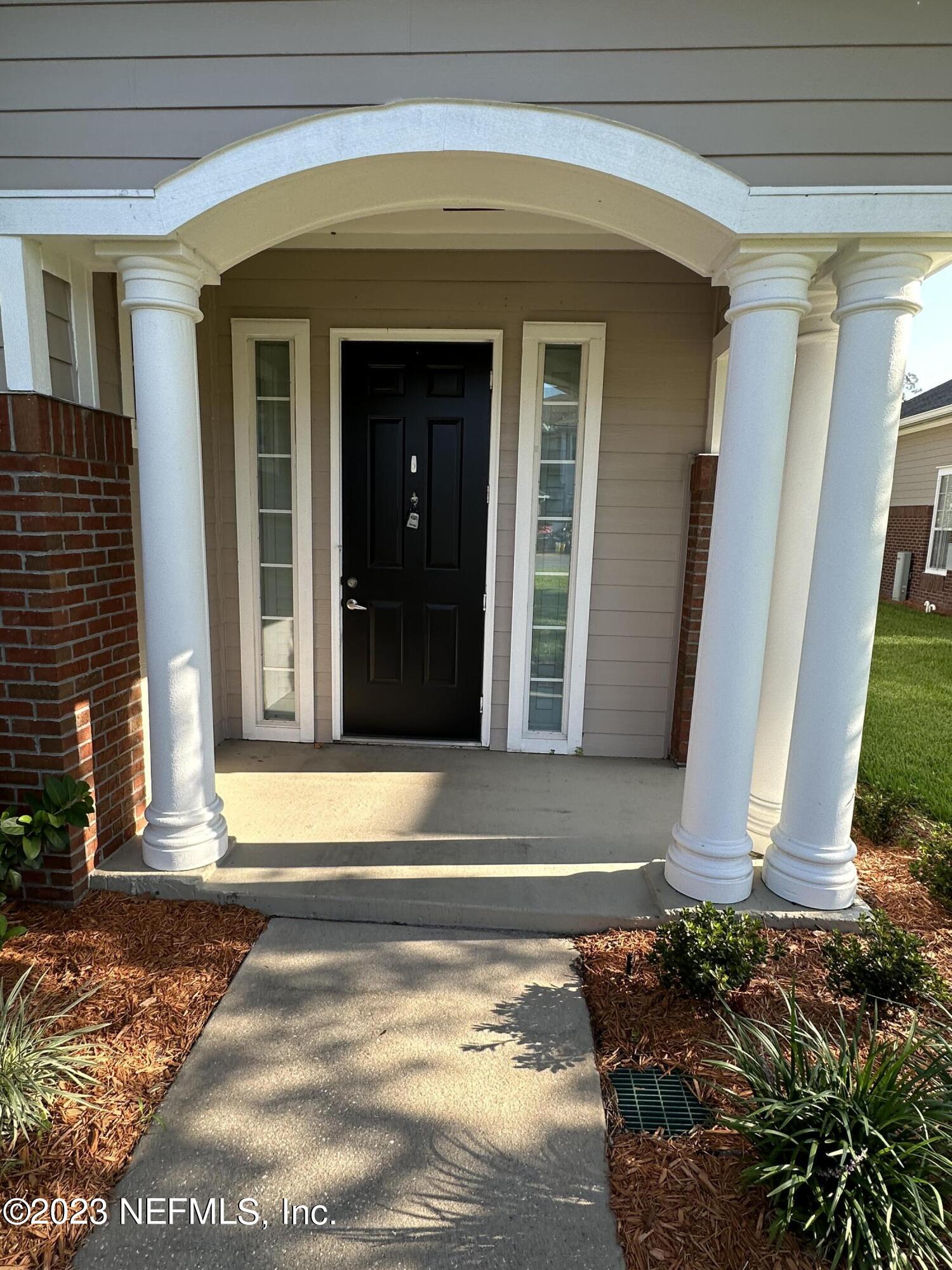 2014 Pond Ridge Court, Unit 1104 Fleming Island, FL 32003 - Photo 3 of 35 Front Door