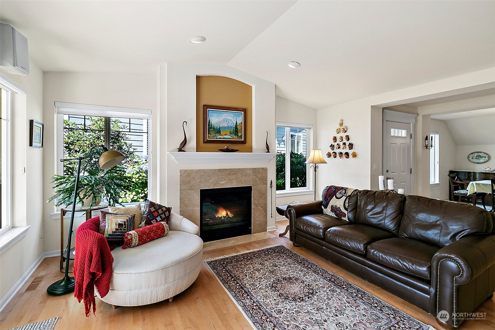 91 East Soderberg Road, Unit C10 Allyn, WA 98524 - Photo 8 of 38 a living room with furniture and a fireplace