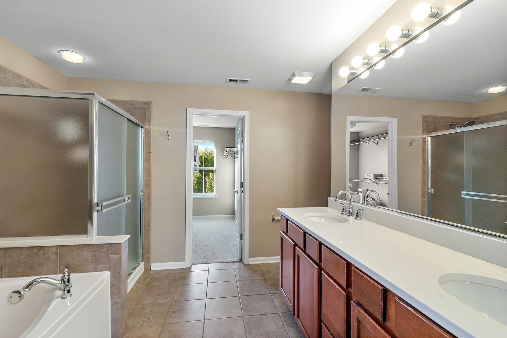 345 Shadow Hill Drive Elgin, IL 60124 - Photo 18 of 35 a bathroom with a sink a toilet and shower