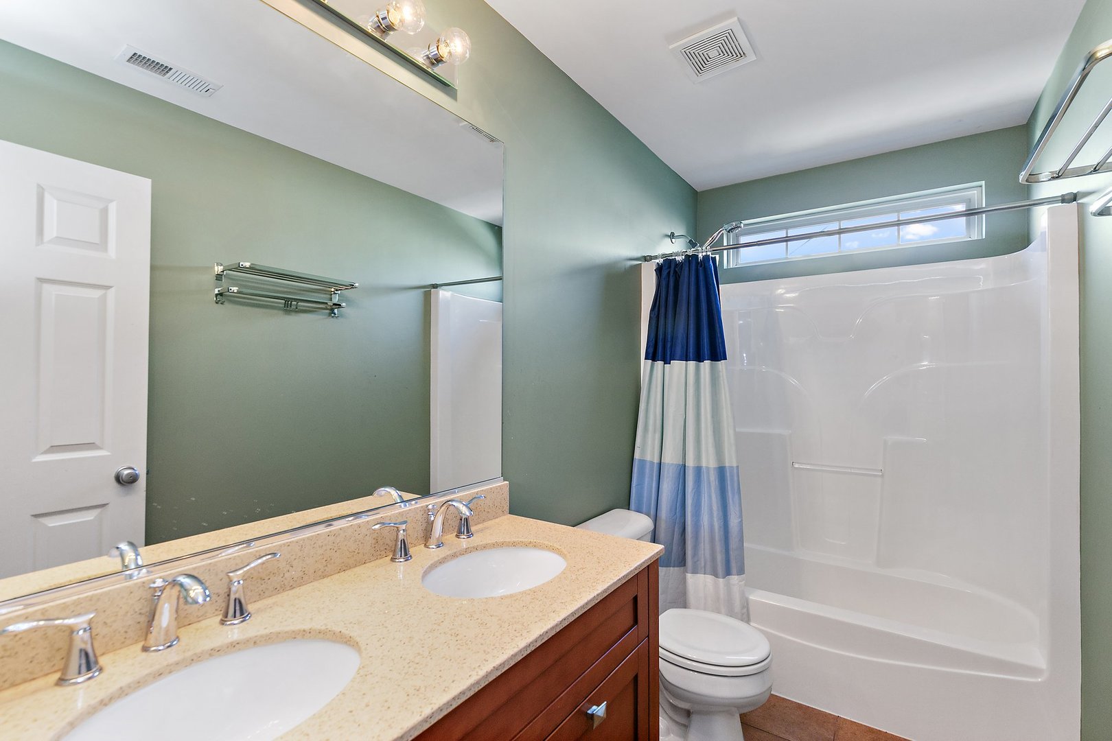 345 Shadow Hill Drive Elgin, IL 60124 - Photo 26 of 35 a bathroom with a sink a toilet and shower