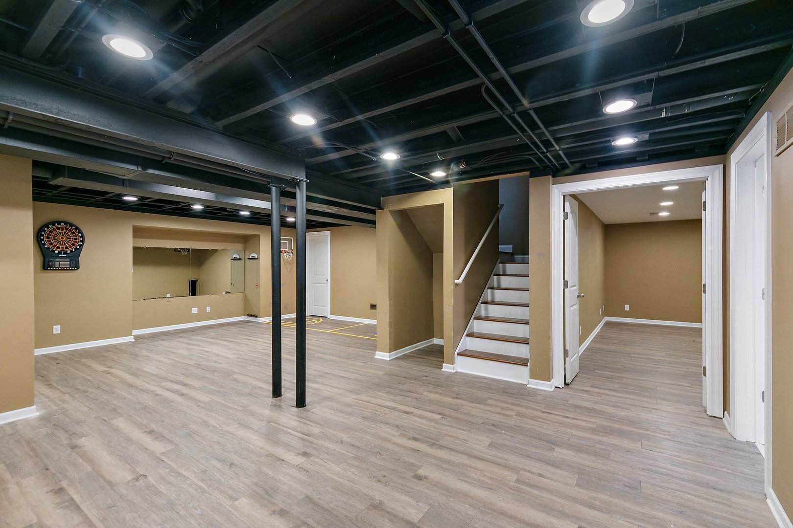 345 Shadow Hill Drive Elgin, IL 60124 - Photo 27 of 35 a view of empty room with stairs and wooden floor