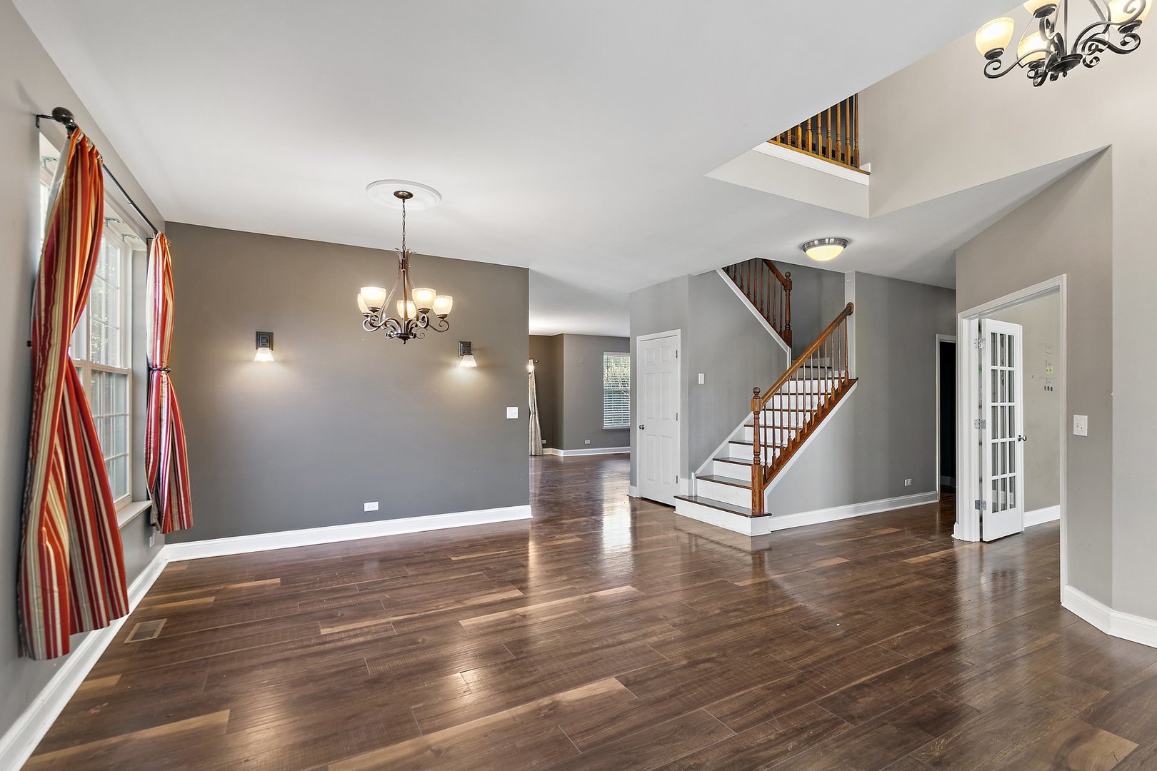345 Shadow Hill Drive Elgin, IL 60124 - Photo 5 of 35 wooden floor in an empty room with a window