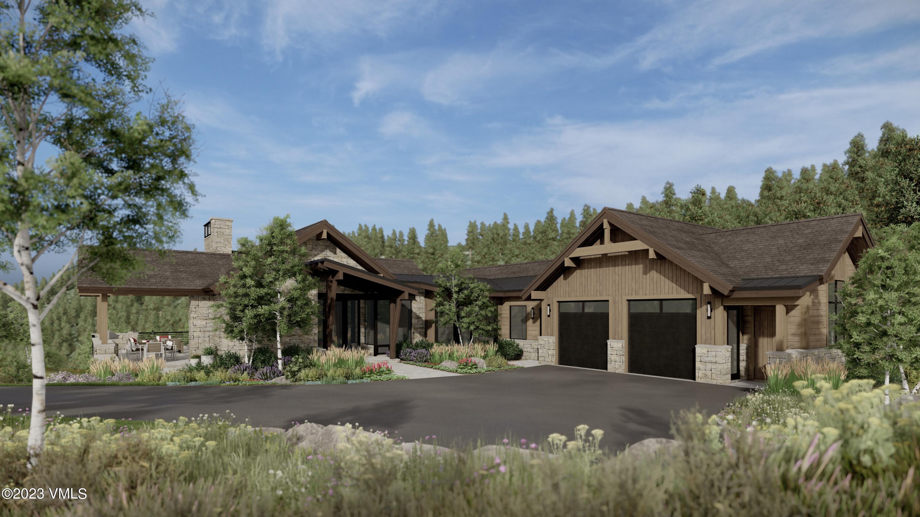 922 Red Draw Edwards, CO 81632 - Photo 13 of 14 a front view of a house with a yard and garage