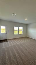 637 The Ugly Way Jarrell, TX 76537 - Photo 7 of 15 an empty room with a window and a projector screen