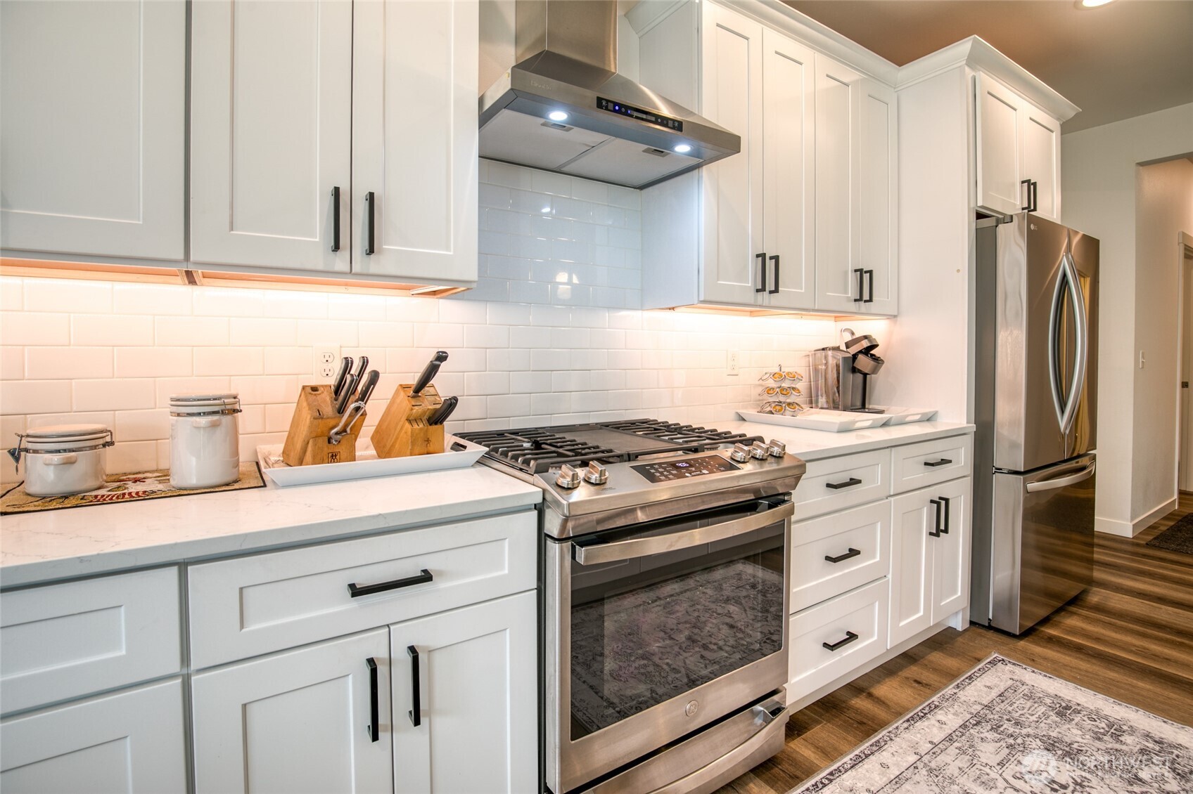 28 Roup Road Montesano, WA 98563 - Photo 14 of 40 a kitchen with granite countertop a sink stainless steel appliances and cabinets