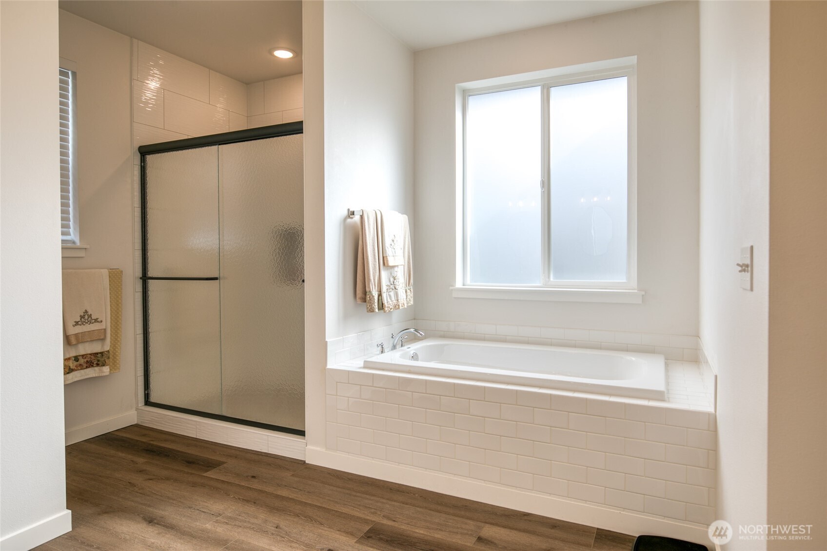 28 Roup Road Montesano, WA 98563 - Photo 19 of 40 a bathroom with a bathtub and a shower