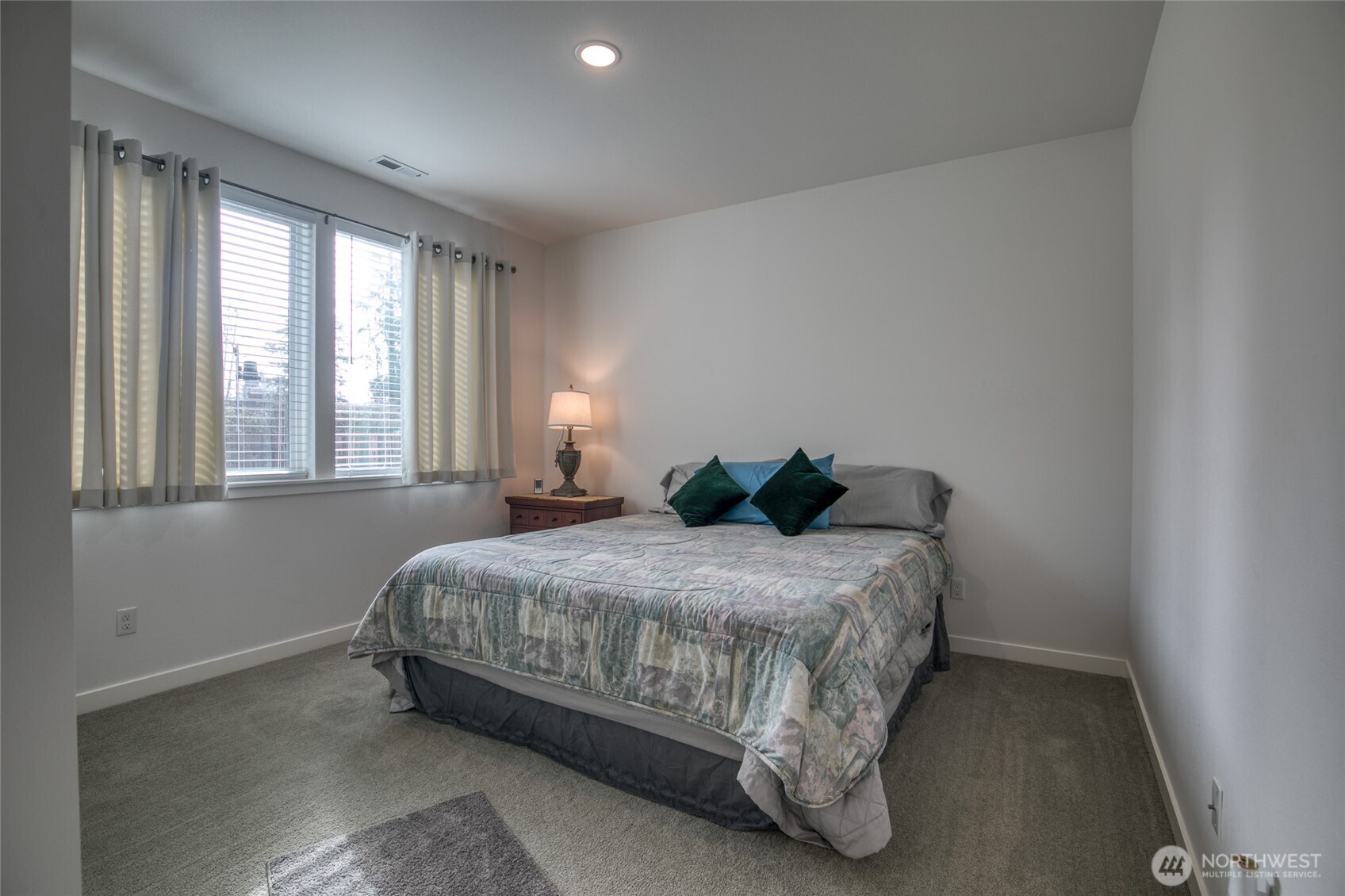 28 Roup Road Montesano, WA 98563 - Photo 23 of 40 a bedroom with a bed and window