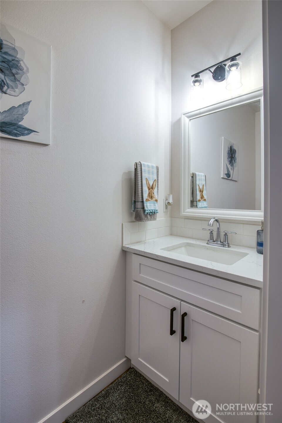 28 Roup Road Montesano, WA 98563 - Photo 28 of 40 a bathroom with a sink and a mirror