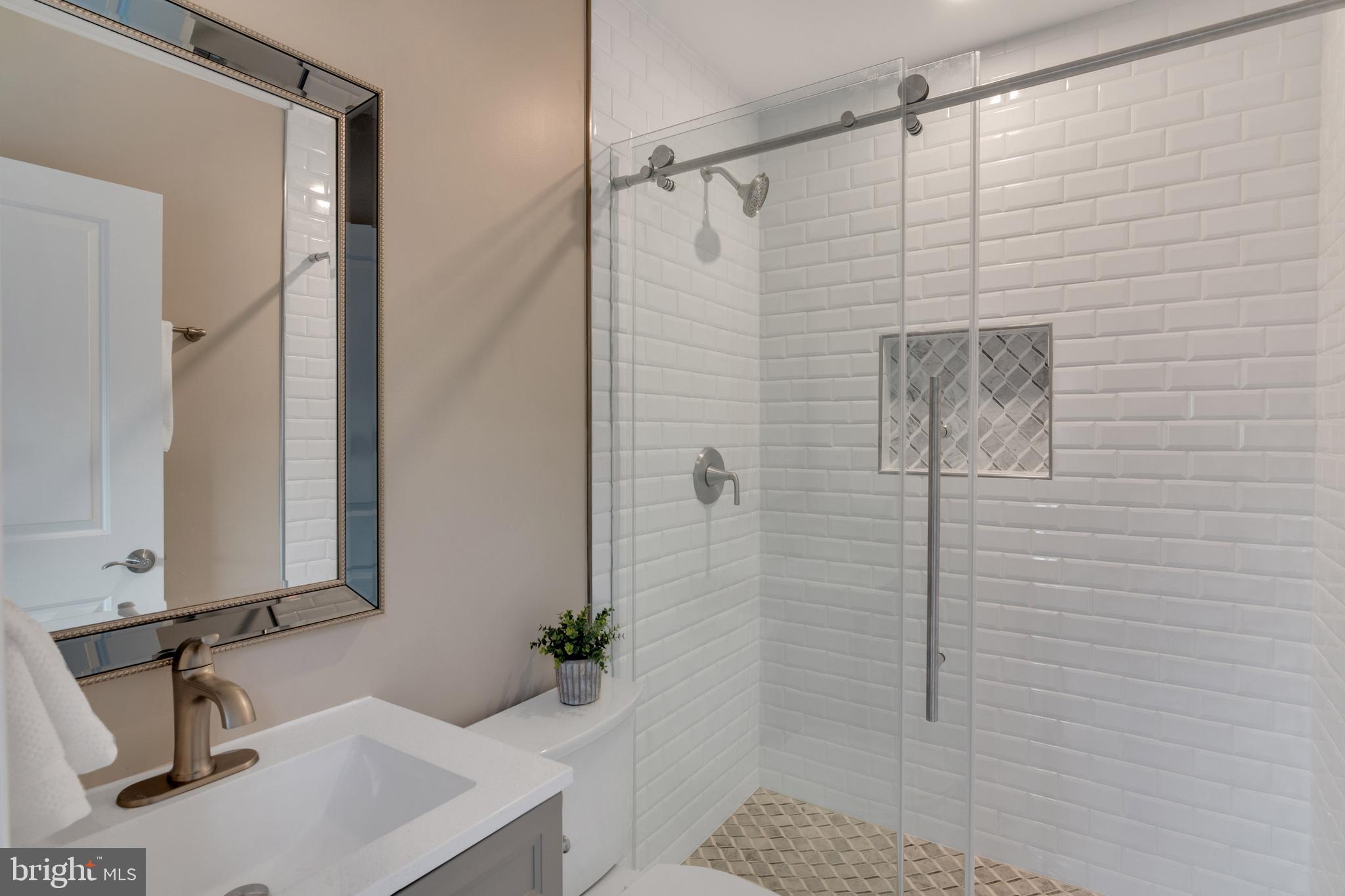 728 Decatur Place Northeast Washington, DC 20017 - Photo 16 of 33 Primary en-suite bathroom