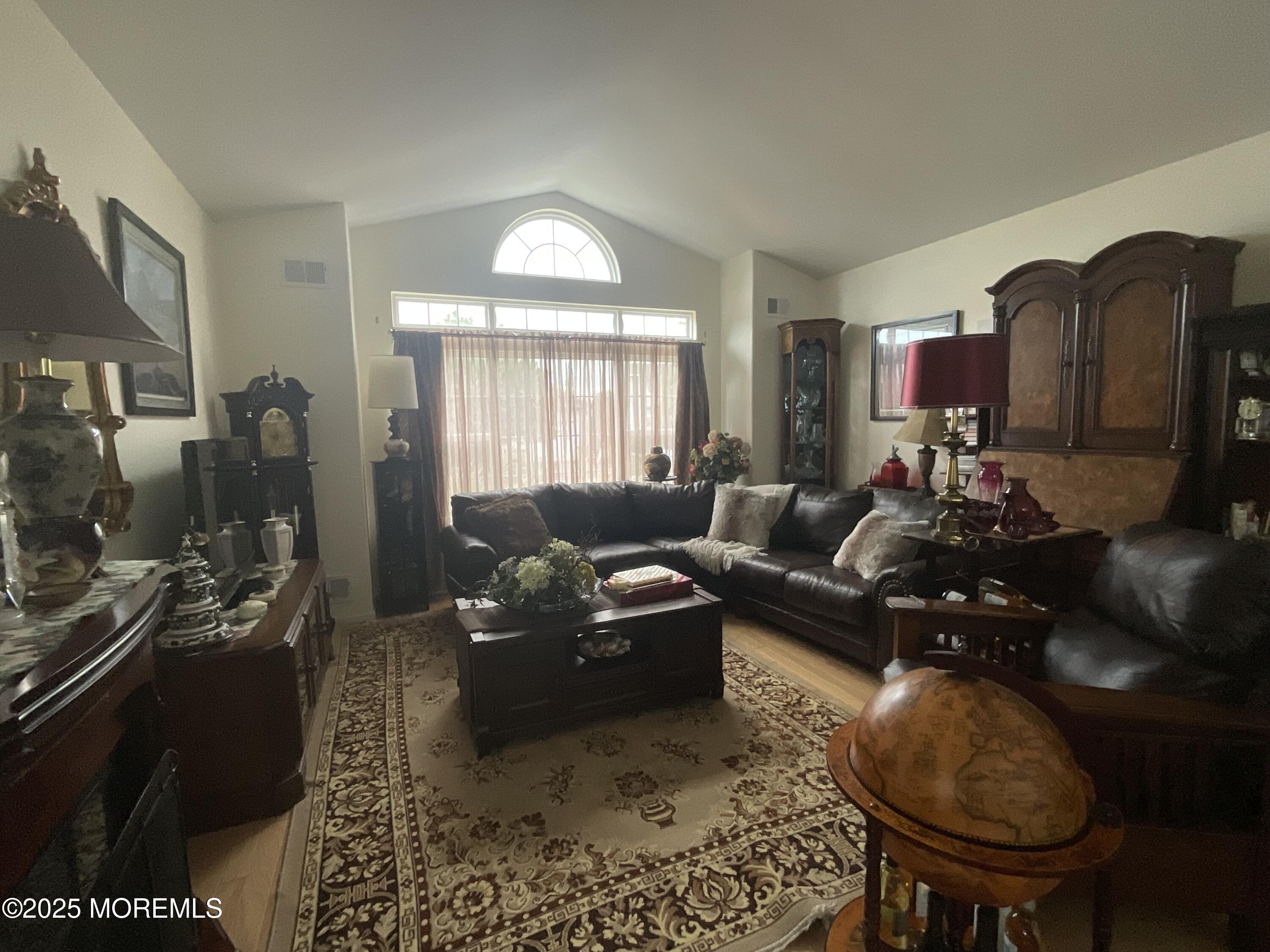 6 Ravenna Road Manchester Township, NJ 08759 - Photo 6 of 14 a living room with furniture and a fireplace