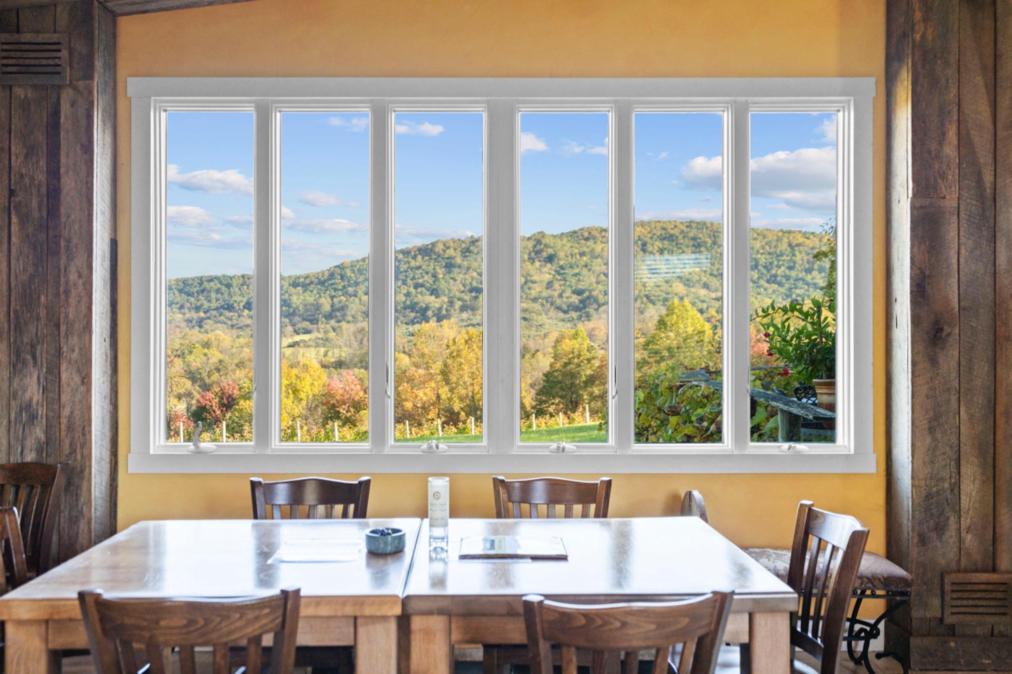 3238 Railstop Road Markham, VA 22643 - Photo 13 of 33 a view of a dining room with furniture large windows and wooden floor