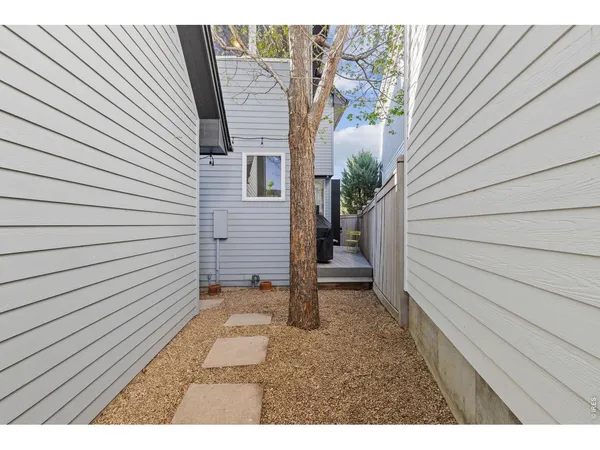 an aerial view of house with a yard