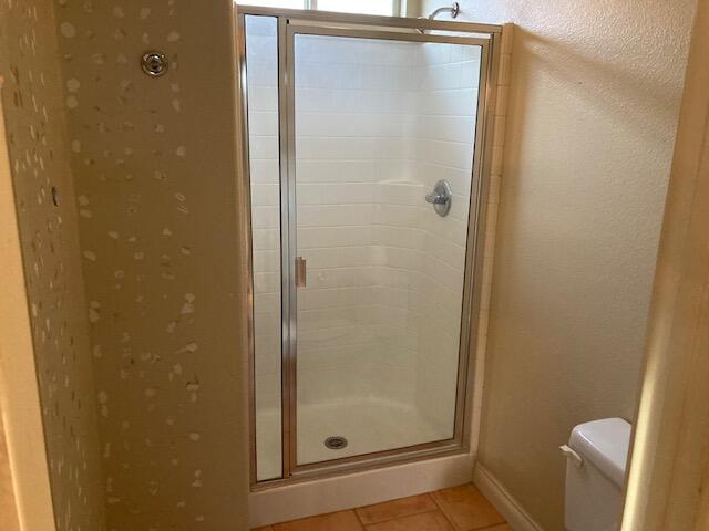 48192 Panorama Avenue Indio, CA 92201 - Photo 36 of 47 a bathroom with a glass door shower