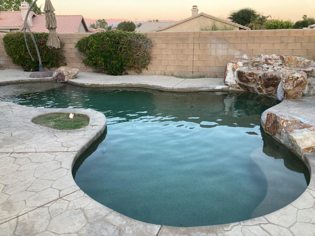 48192 Panorama Avenue Indio, CA 92201 - Photo 39 of 47 a view of a lake in middle of the house