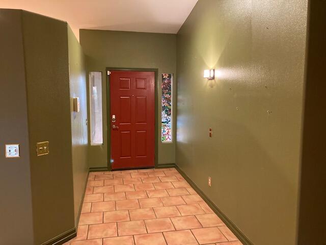 48192 Panorama Avenue Indio, CA 92201 - Photo 6 of 47 a view of a hallway with wooden door