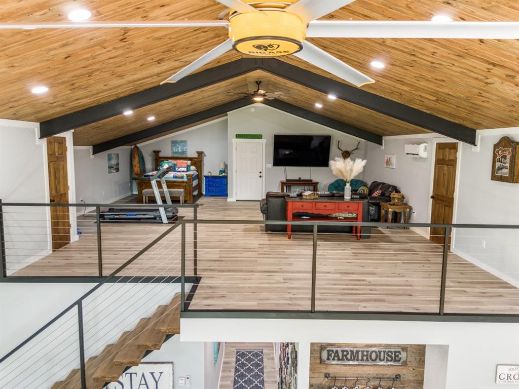 385 Brown Road Palo Pinto, TX 76484 - Photo 6 of 18 a view of a room with gym equipment