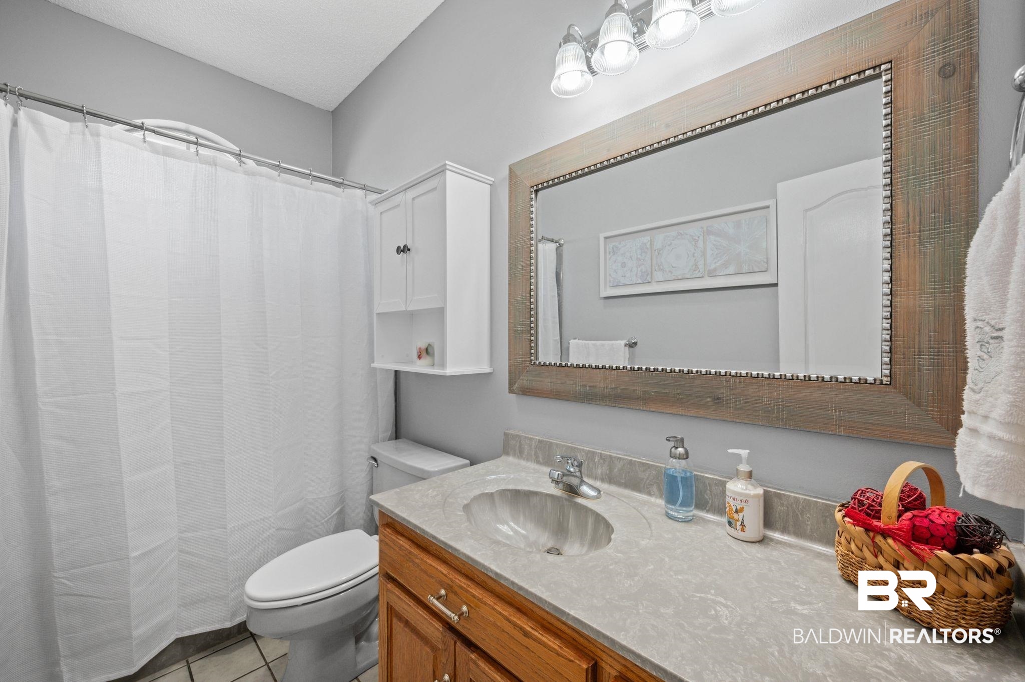 3100 Radcliff Road Saraland, AL 36571 - Photo 35 of 65 Bathroom featuring toilet, tile patterned floors, and vanity