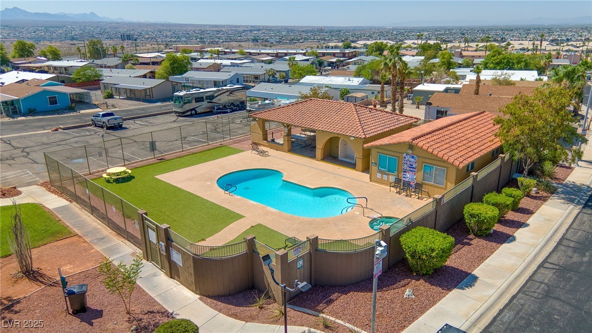 3262 Del Monte Street Laughlin, NV 89029 - Photo 31 of 42 View of pool featuring a residential view, a fenced backyard, and a patio area