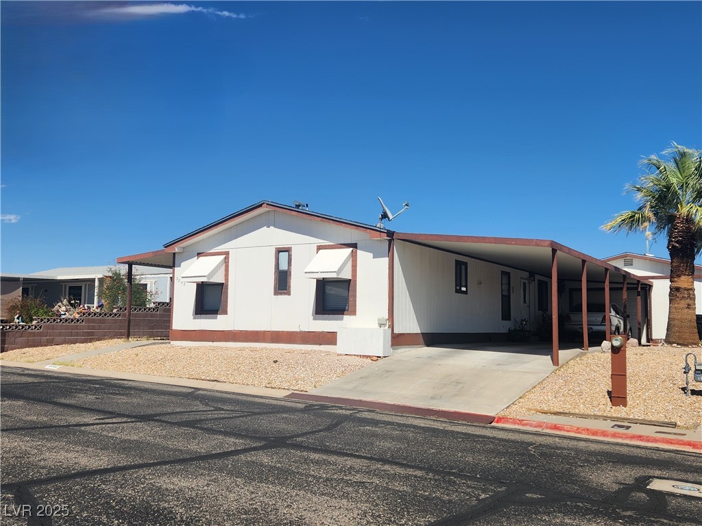 3262 Del Monte Street Laughlin, NV 89029 - Photo 5 of 42 View of front of property with a carport and concrete driveway