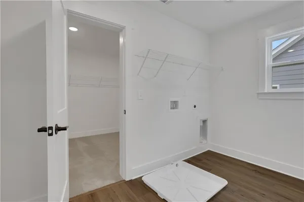 a view of a park with iron fence