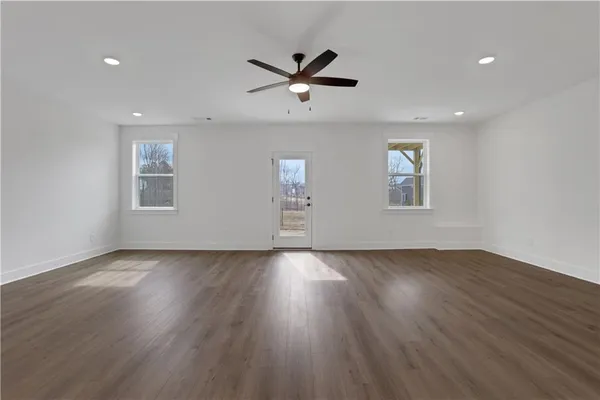 a view of a park with large trees