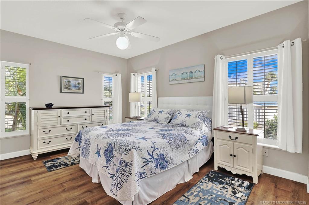 10701 South Ocean Drive, Unit 855 Jensen Beach, FL 34957 - Photo 32 of 67 a bedroom with a bed and a window