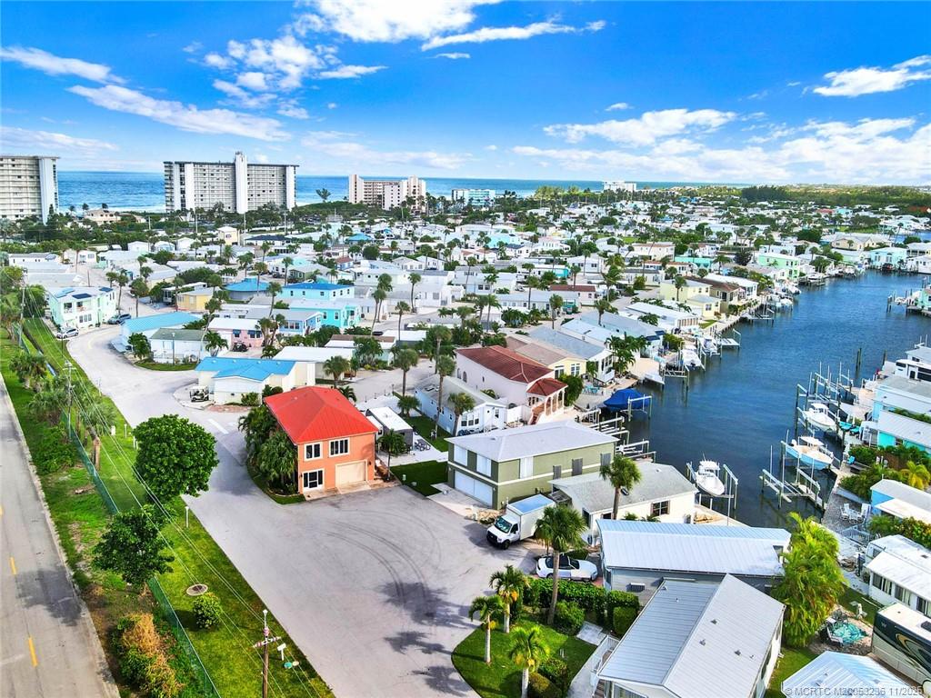 10701 South Ocean Drive, Unit 855 Jensen Beach, FL 34957 - Photo 42 of 67 an aerial view of a city