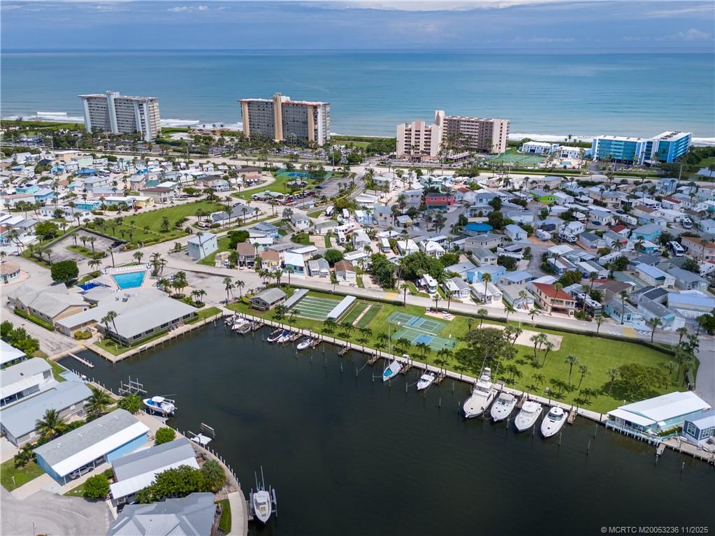 10701 South Ocean Drive, Unit 855 Jensen Beach, FL 34957 - Photo 55 of 67 an aerial view of a city