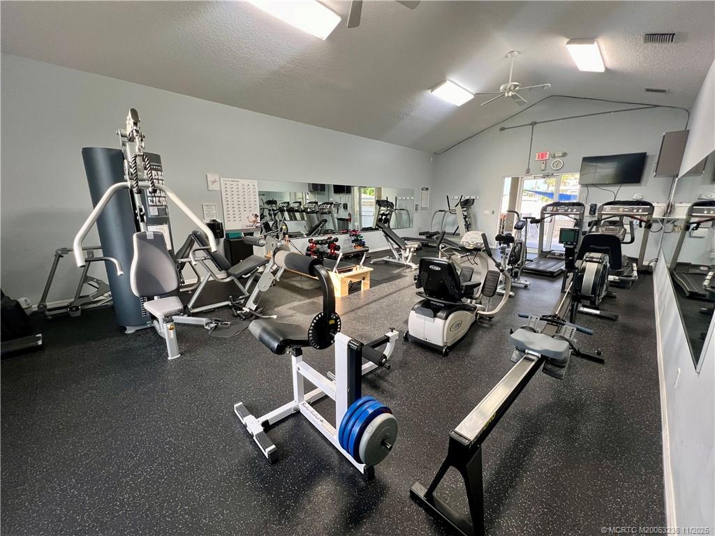 10701 South Ocean Drive, Unit 855 Jensen Beach, FL 34957 - Photo 62 of 67 a view of a room with gym equipment