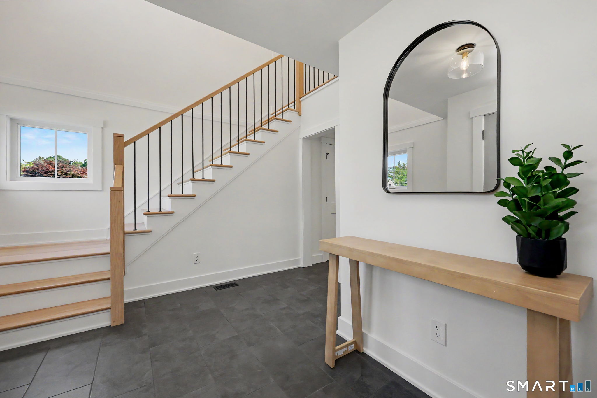 91 Lockwood Road Fairfield, CT 06825 - Photo 3 of 38 a view of entryway with wooden floor