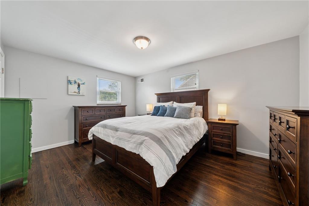 2415 Collins Road Pittsburgh, PA 15235 - Photo 20 of 32 a bedroom with a bed and a flat screen tv