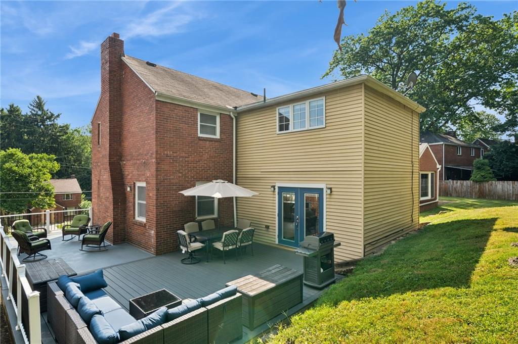 2415 Collins Road Pittsburgh, PA 15235 - Photo 30 of 32 a view of a house with backyard tub and chairs