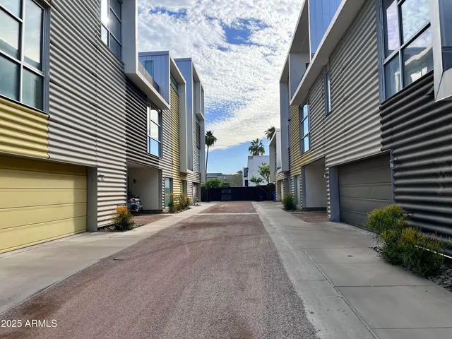 a view of a street with a house