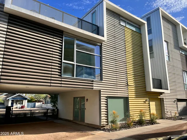 a front view of a house with garage
