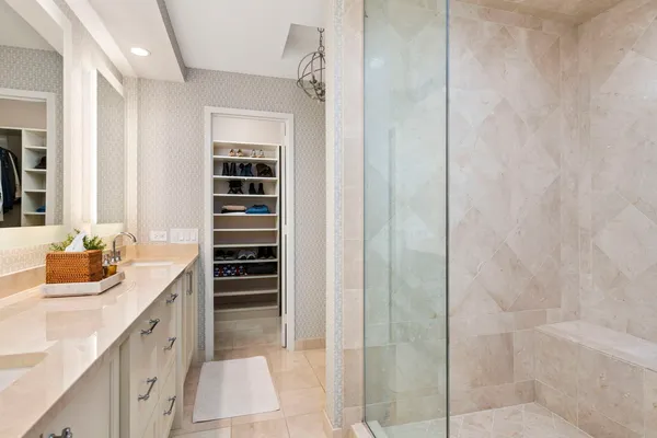 a bathroom with a shower and a toilet