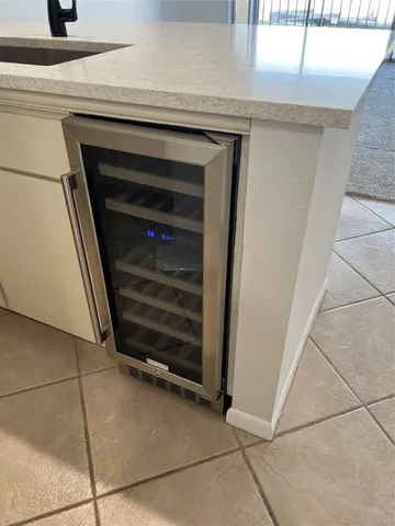 a stove top oven sitting inside of a kitchen