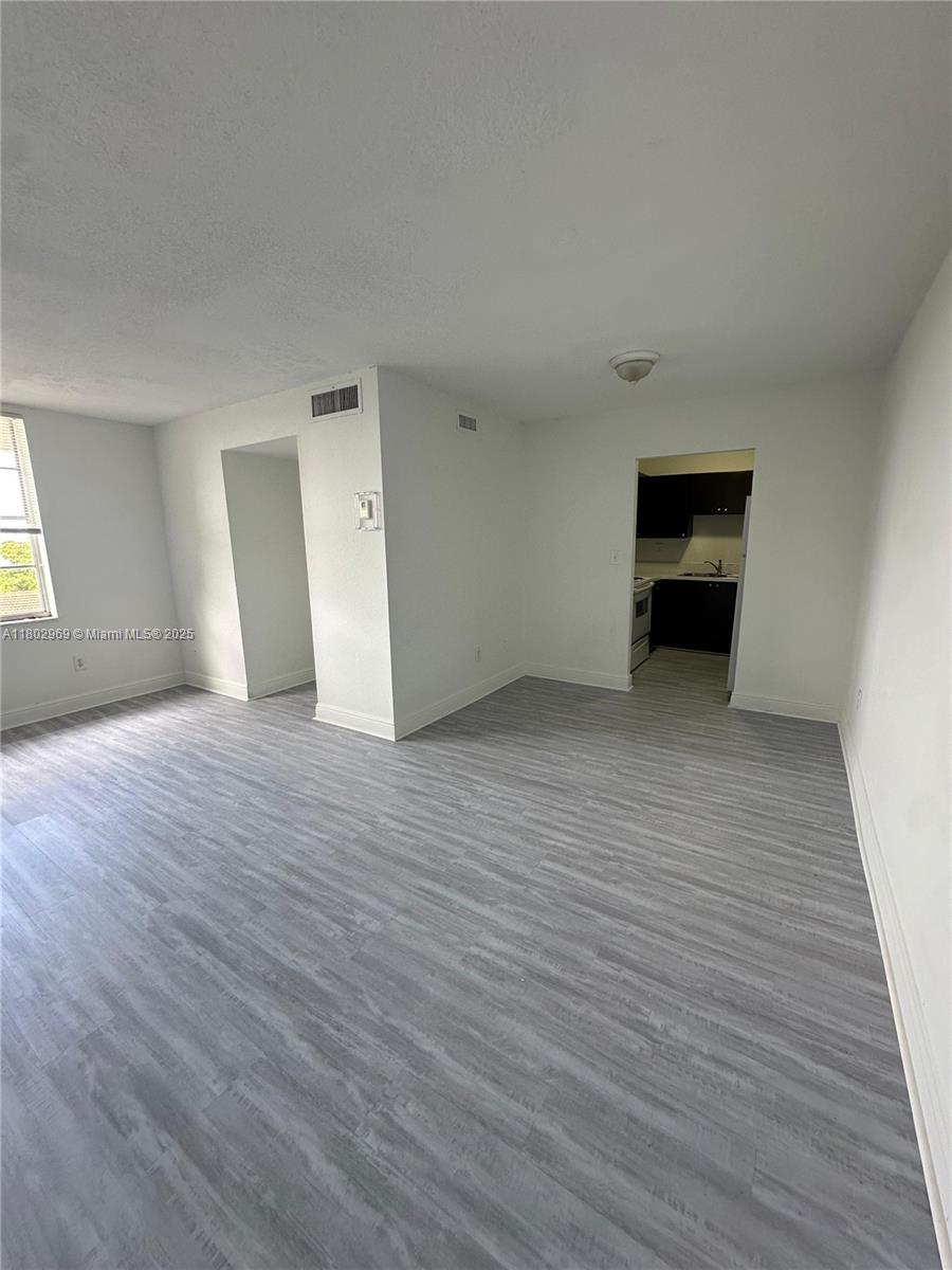 1825 West 56th Street, Unit 410 Hialeah, FL 33012 - Photo 2 of 18