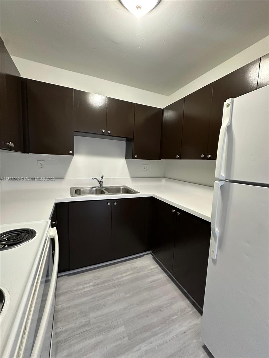 1825 West 56th Street, Unit 410 Hialeah, FL 33012 - Photo 4 of 18