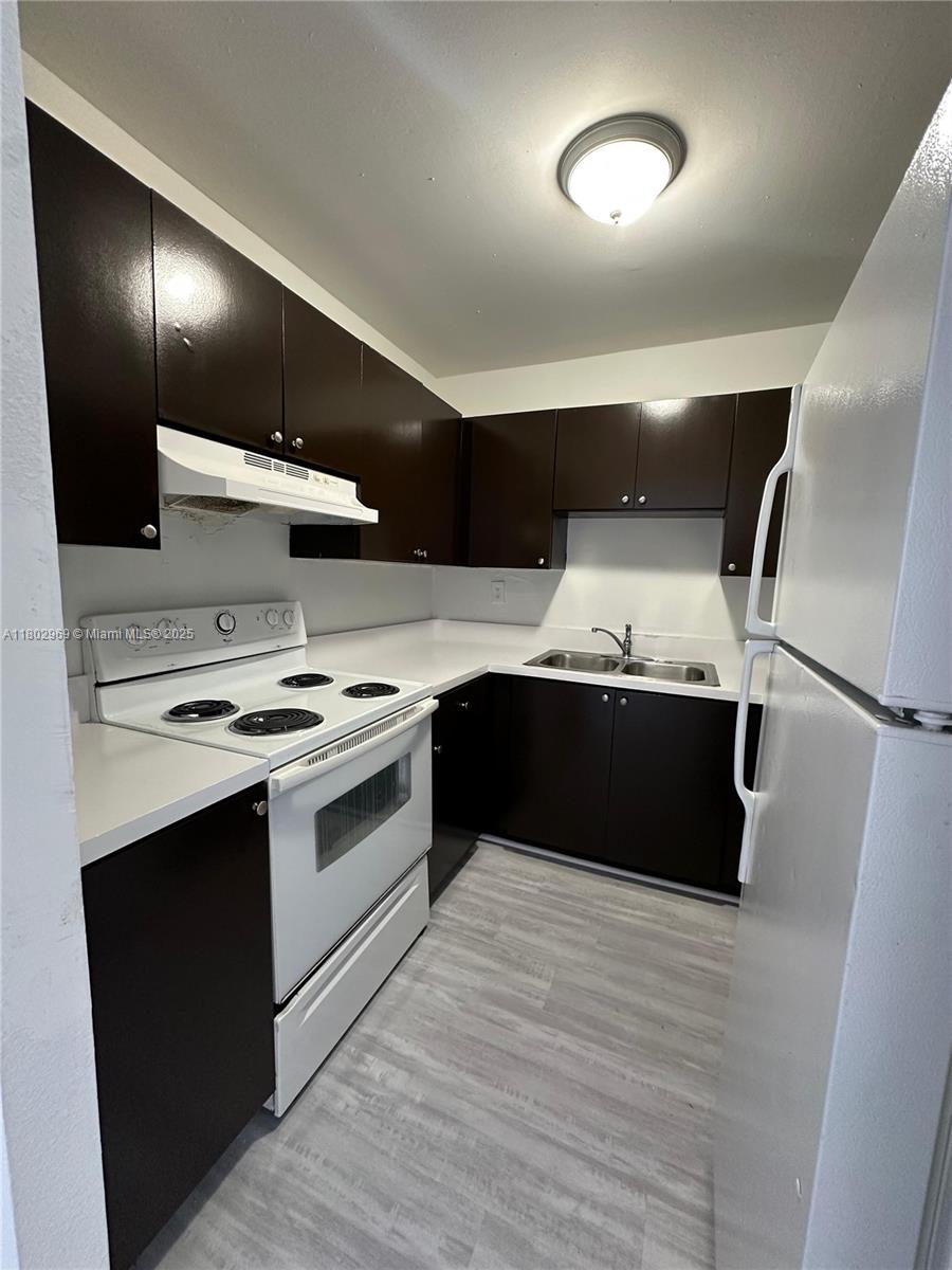 1825 West 56th Street, Unit 410 Hialeah, FL 33012 - Photo 5 of 18