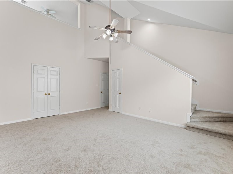 3323 Sainte Mere Eglise Lane Spring, TX 77388 - Photo 21 of 33 an empty room with a chandelier fan