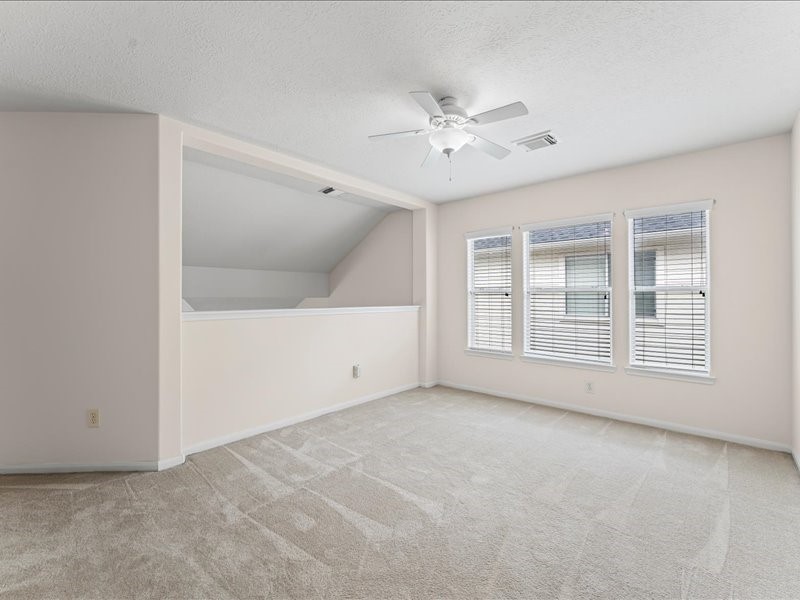 3323 Sainte Mere Eglise Lane Spring, TX 77388 - Photo 22 of 33 a view of an empty room with a window