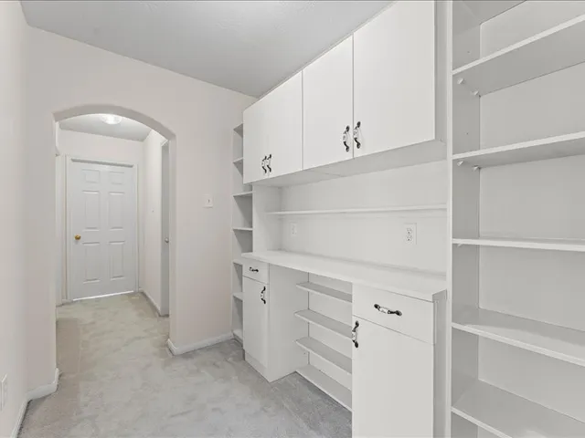 a view of an empty walk in closet