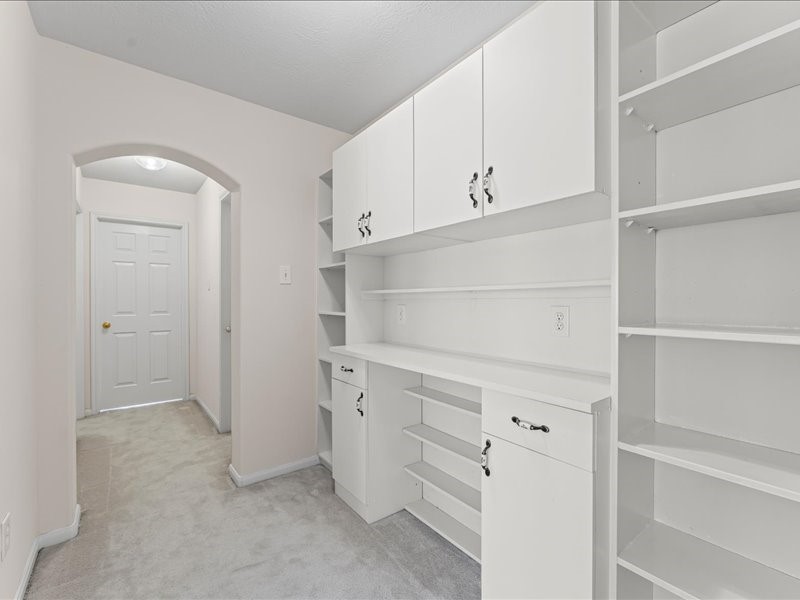 3323 Sainte Mere Eglise Lane Spring, TX 77388 - Photo 24 of 33 a view of an empty walk in closet