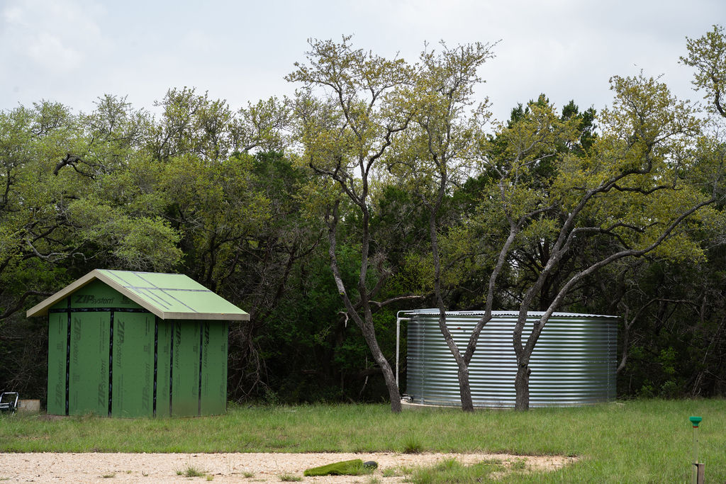 426 Mill Run New Braunfels, TX 78132 - Photo 33 of 40 a view of a wooden deck with a big yard