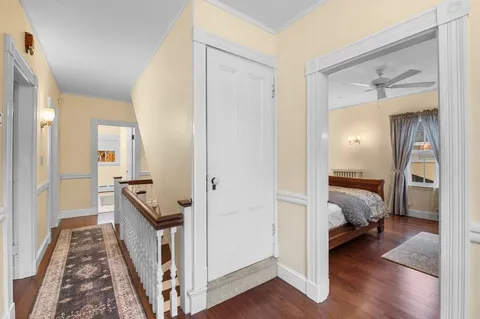 a view of a bedroom from a hallway