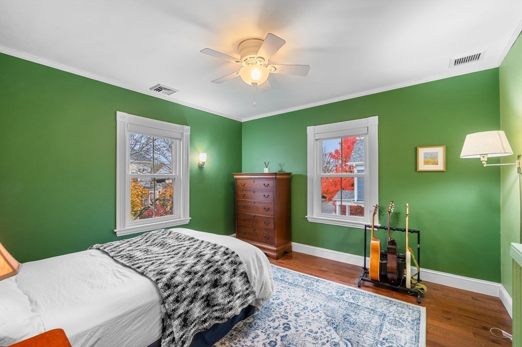 5 Beacon Street Danvers, MA 01923 - Photo 24 of 37 a bedroom with a bed and a television